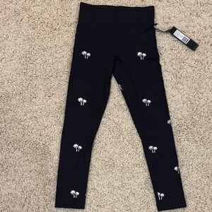 Stylish Black Leggings with Palm Tree Design